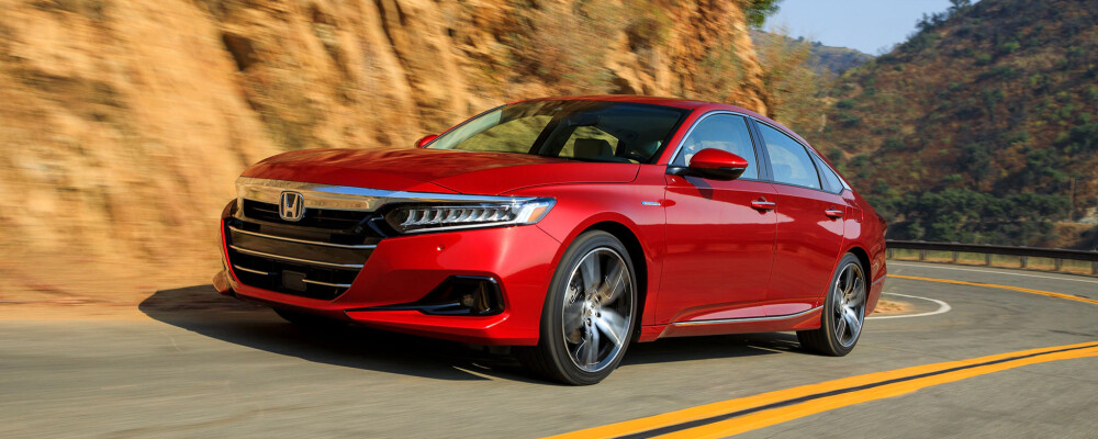 red 2021 honda accord hybrid on mountain road