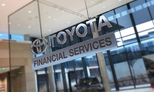 a hanging toyota financial services sign