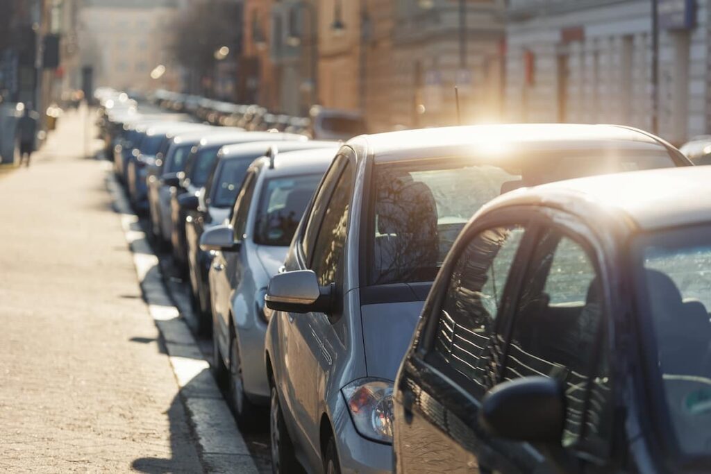 Rows of cars being left out under the sun