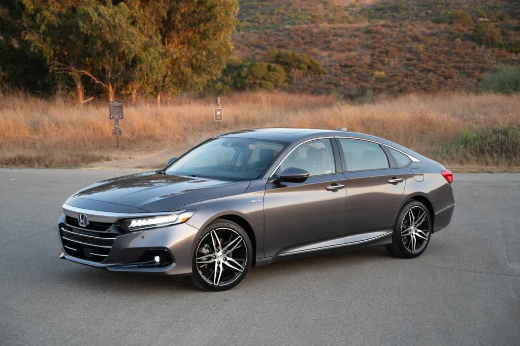 2022 Honda Accord Hybrid parked outdoors, showcasing a fuel-efficient and comfortable sedan ideal for long commutes.